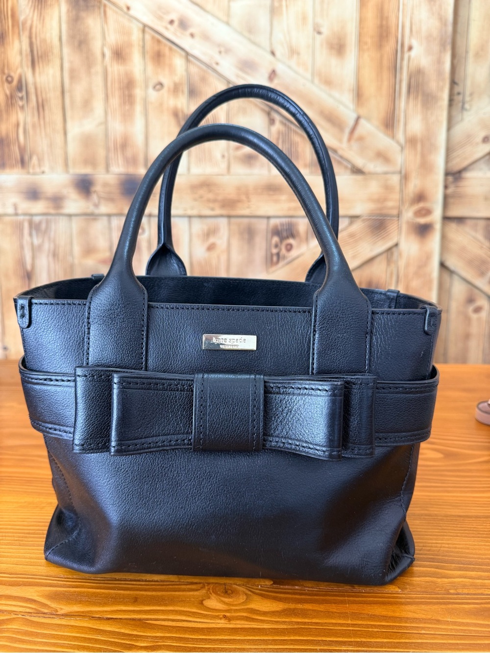 kate spade black leather tote with exterior bow